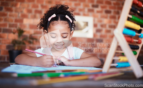 Image of Homework, writing and child at home with smile, learning and happy for project. Young girl, problem solving and knowledge development at a house with student education and notes at table for school