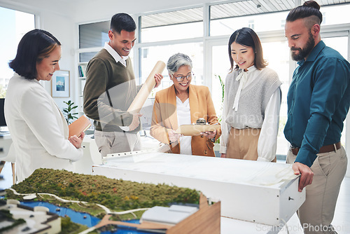 Image of Business, group and staff with blueprint, architecture or planning with teamwork, brainstorming or meeting for development. People, engineer or coworkers with paperwork, conversation or collaboration