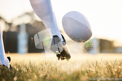 Image of Rugby ball, feet kick and sport game with support, exercise and competition with athlete training. Field and target practice on grass with cardio, fitness and workout with shoe and boot closeup