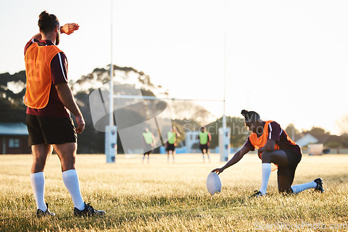 Image of Rugby, sun and sport game with support, exercise and competition with athlete ball training. Field, back and target practice on grass with cardio, fitness and team workout outdoor for teamwork