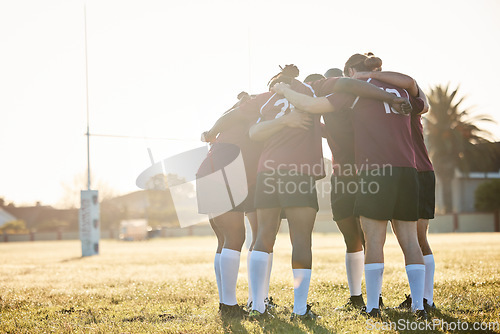 Image of Rugby, training and a sports team in a huddle on a field for a game, competition or fitness practice. Teamwork, exercise and workout with a group of athlete men in a circle together for preparation