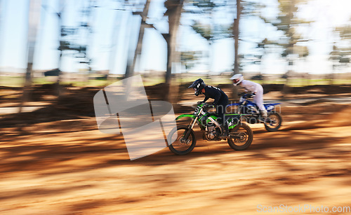 Image of Race, motorbike and sports, men with speed for practice and training in fast adventure. Professional dirt biking, motion blur and off road motorcycle competition, performance and challenge in woods.