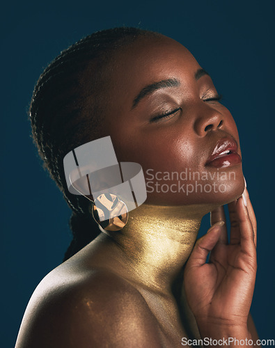 Image of Beauty, gold and makeup with face of black woman for creative, luxury and cosmetics. Glow, glamour art and design with profile of model on dark background for elegant, skincare and salon treatment