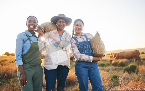 Image of Farm portrait, women and countryside with a smile from working on a grass field with feed bag. Sustainability, eco friendly and agriculture outdoor at sunset in nature with farming cows and mission