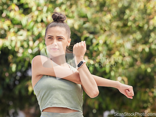 Image of Stretching, thinking and a woman in nature for fitness, running start or getting ready for cardio. Workout, idea and a young runner, athlete or girl with a warm up in a park for training or exercise