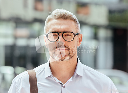 Image of Mature business man, city and portrait with glasses, bag and ready for walk, travel and outdoor in metro. Entrepreneur, CEO or manager in road, traffic or sidewalk with pride on serious face in Milan