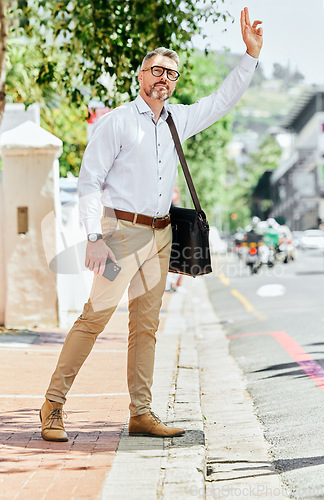 Image of Businessman, travel or stop for taxi in city, commute and trip to work on road with phone. Mature person, employee or entrepreneur wave, hailing or transportation service hand gesture with technology