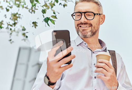 Image of City, smile and a businessman with a phone and coffee for morning travel, communication or a chat. Happy, executive and a mature employee reading a conversation on a mobile from an app with a drink