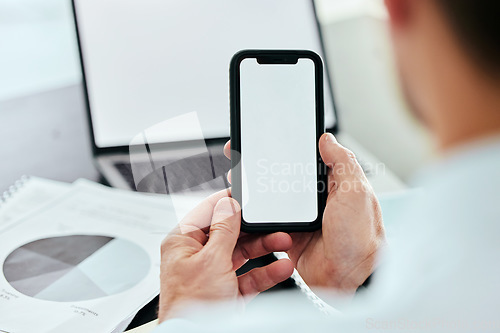 Image of Mockup space, phone and hands of man with laptop in office for internet, connection and mobile app brand. Advertising, technology and business worker online on smartphone for social media with graph