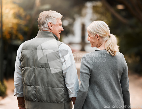 Image of Relax, love and holding hands with old couple in nature for bonding, happy or peace. Smile, happiness and retirement with senior man and woman walking in countryside park for vacation and commitment