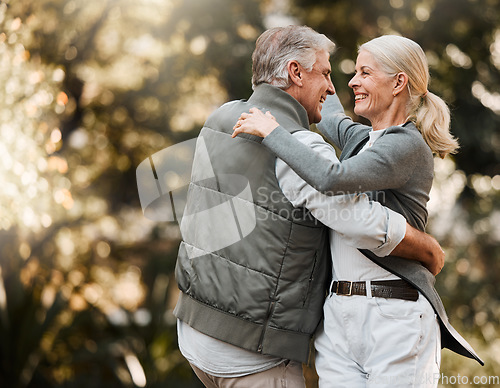 Image of Love, nature and senior happy couple dance, have fun and enjoy quality time together in park, forest or woods. Outdoor wellness, energy and elderly people care, support or bonding during retirement