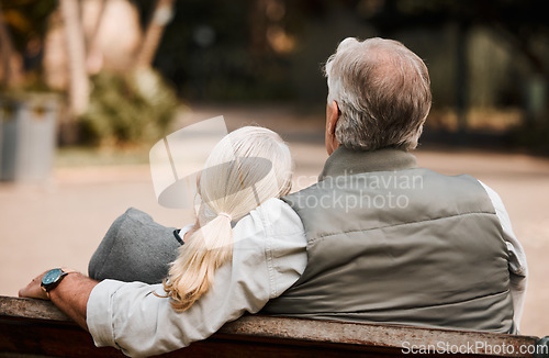 Image of Love, park bench and back of relax couple bonding, care and enjoy time together, nature view and forest freedom. Natural wellness, marriage and outdoor people support, care and on romantic woods date