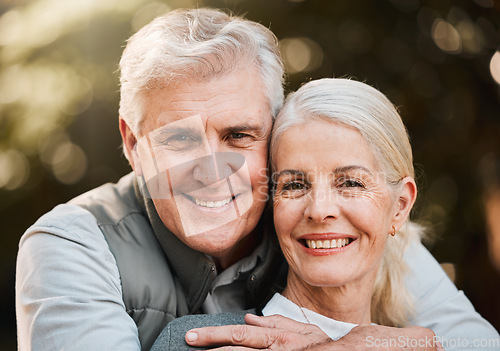 Image of Smile, portrait and senior couple hug at a park with love, free and enjoy travel, holiday or weekend. Face, happy and elderly man embrace woman in forest, bond and fun on retirement trip together