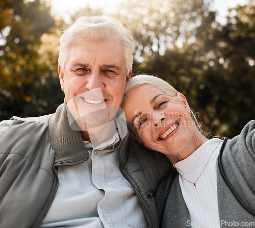 Image of Love, portrait and senior couple hug in a forest, happy and bond in nature on a weekend trip together. Smile, face and romantic old woman embrace elderly male in woods, cheerful and enjoy retirement