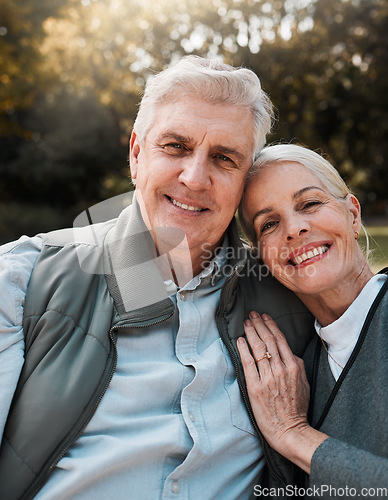 Image of Smile, portrait and senior couple hug in a forest, love and bond in nature on a weekend trip together. Happy, face and romantic old woman embrace elderly male in woods, cheerful and enjoy retirement