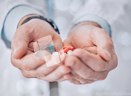 Image of Hands, pills and doctor closeup or pharmacist with healthcare, medical person or medicine drugs. Hospital, clinic or pharmacy with pharmaceutical, wellness and virus prevention medication for care