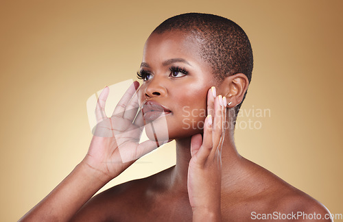 Image of Face, makeup and beauty of a black woman in studio for self care, skin glow and cosmetics. Headshot of african person or aesthetic model with facial shine and eyelash extension on a beige background