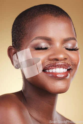 Image of Beauty, makeup and face of a black woman in studio for self care, skincare and cosmetics. Headshot of african person or aesthetic model with facial shine, dermatology and glow on a beige background