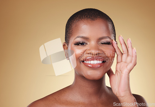 Image of Beauty, makeup and portrait of a black woman in studio with hands on face for skin care, glow and cosmetics. African model person with facial shine, dermatology and wellness on a beige background