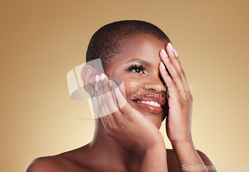 Image of Black woman, hands touching face and beauty with natural cosmetics isolated on studio background. African model, manicure and nail care with smile, makeup and dermatology with skincare and glow