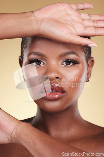 Image of Beauty, face and a black woman with makeup in studio for skin care, glow and cosmetics. Portrait of african person or aesthetic model with facial shine, dermatology and wellness on a beige background