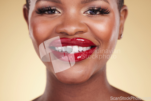 Image of Red lipstick, black woman, beauty and portrait, makeup and smile, skin and shine isolated on studio background. Bold cosmetic product, lips and cosmetology, elegance and glamour with color and glow