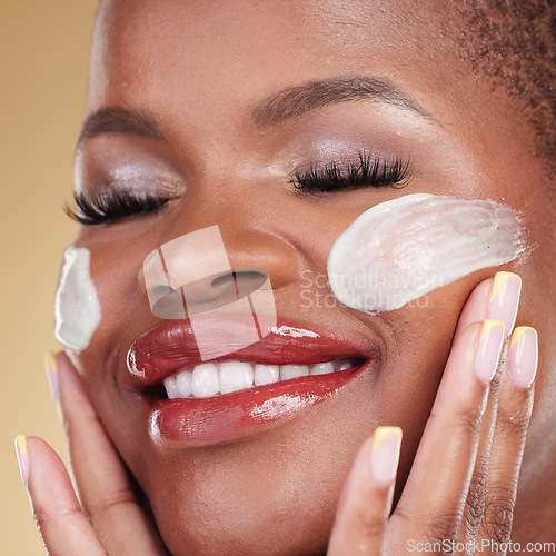 Image of Skincare, face cream and happy black woman in studio for cosmetic application, wellness and hydration. Facial, cleaning and African beauty model with exfoliate, moisturizer or mask for makeup removal