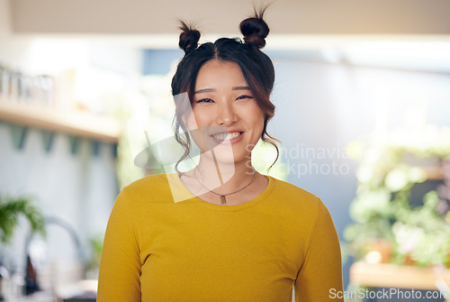 Image of Asian, woman and happy portrait in home with happiness of cool gen z person in kitchen, living room or apartment. Smile, face of girl and unique fashion, hair style or casual confidence in house