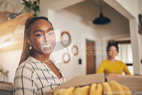 Image of Black woman, portrait and new home with cardboard boxes for moving and property investment. Happy face, smile and couple of friends excited with package for real estate in a living room together