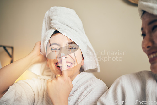 Image of Happy, portrait and friends with a spa day in a house with cream for skincare and wellness. Smile, relax and women with lotion or sunscreen for facial health, playful and bonding with beauty therapy