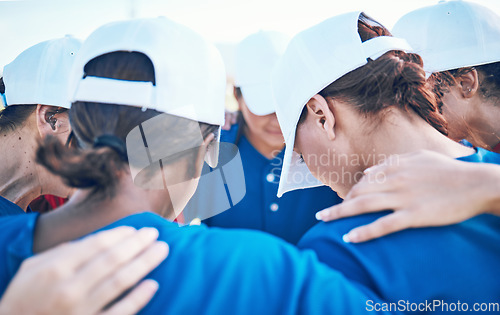 Image of Women, team and softball, game plan or praying together, sports and fitness, support and trust on pitch. Athlete, group of people and mission, faith and hope with baseball club huddle and community