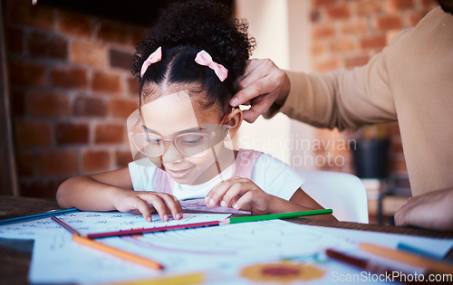 Image of Homework, drawing and child at home with parent, care and learning for project. Young girl, problem solving and knowledge at a house with student education, mother and notes at table for school