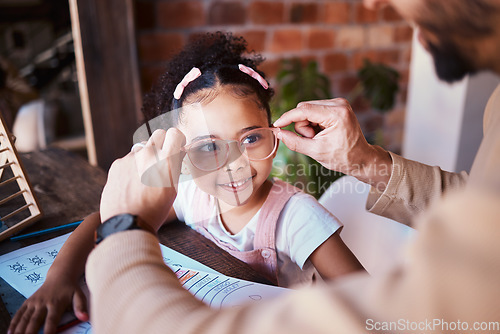 Image of Glasses, smile and a child with a father and homework in a house with help and education. Happy, family and a father with eyewear for a girl kid during homeschool work, learning and teaching