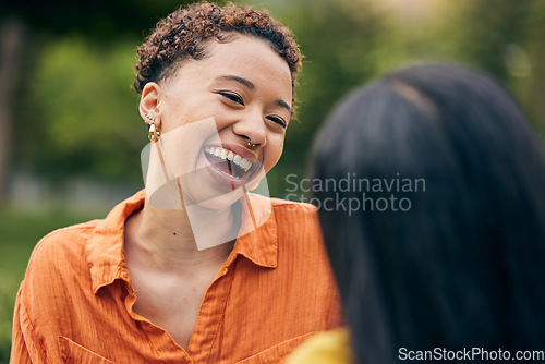 Image of Face, smile and laughing with a black woman in the park with a friend for funny humor in summer. Freedom, comedy and sunshine with a happy young female person laughing at a joke outdoor in nature