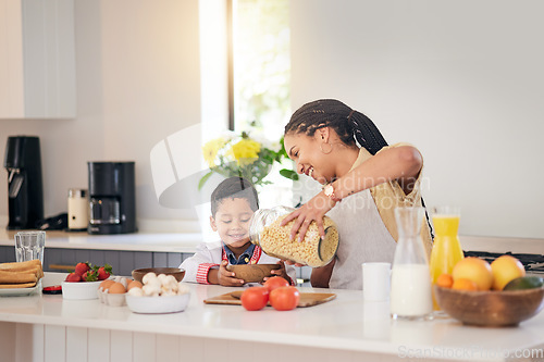 Image of Breakfast, smile and food with family and cooking with kids morning cereal at a home. Kitchen, love and support of a mother and young child with teaching and parent care for baking learning together