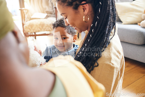 Image of Family, lesbian mother and son in the living room of their home together for love or bonding closeup. Smile, happy and gay or lgbt woman bonding with her boy child in a house to relax on the weekend