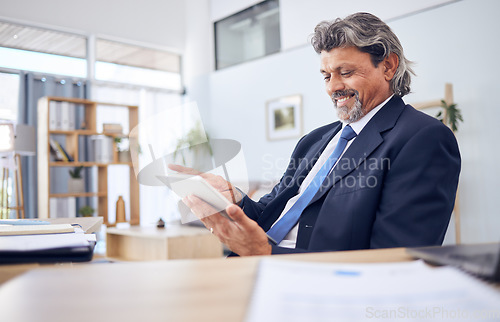 Image of Tablet, smile and a senior business manager in his office for professional research or planning a project. Technology, schedule and a happy mature CEO man in the workplace for corporate management