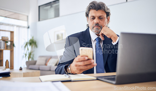 Image of Networking, laptop and a business man with a phone for research, information technology or contact. Professional person with a smartphone and thinking of planning, reading email or communication