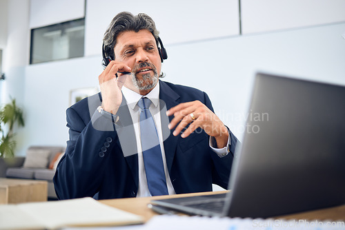 Image of Business man, call center and laptop for consultant in communication, sales or virtual meeting. Corporate agent, financial advisor or manager speaking on computer or video for work from home webinar