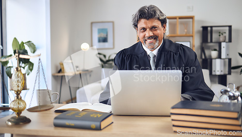 Image of Portrait, laptop and a senior man judge in his office for legal research or planning for a trial. Computer, case file and a happy mature government employee in the workplace for a judgment ruling