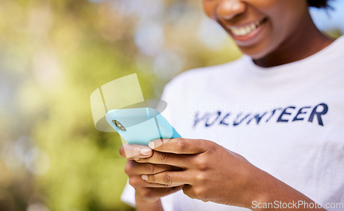 Image of Person hands, phone and volunteering in park with social media FAQ, blog or community service website. Happy student on mobile or chat for earth day information, NGO or nonprofit contact in nature