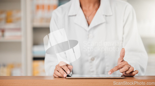 Image of Pharmacist hands, tablet and typing on desk, counter and click app for sales, help and store for health. Pharmaceutical worker, digital touchscreen and press for schedule, contact or communication