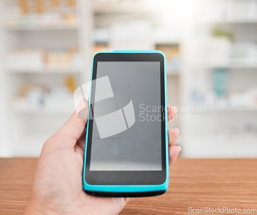 Image of Pharmacist hand, payment machine screen and closeup for credit card, mockup space or pov in store for healthcare. Person, pos tech and promotion in medical sales, shopping or digital commerce at desk