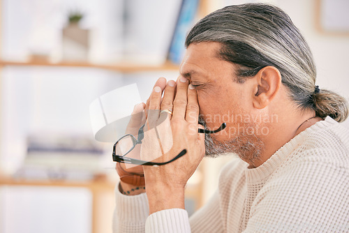 Image of Frustrated senior man, headache and stress in debt, burnout or financial crisis at home. Mature male person with migraine, eye strain or anxiety in depression, mental health or pain or overworked