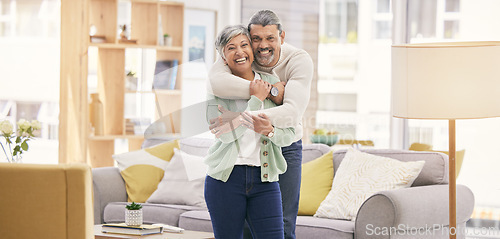 Image of Portrait, hug and senior couple with love, home and happiness with care, bonding and retirement. Lounge, old man and mature woman embrace, affection and loving together with marriage and relationship