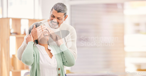 Image of Eyes closed, surprise and elderly couple in a retirement home and living room together. Mockup space, present and senior people in marriage with love, support and care with romance and happy laugh