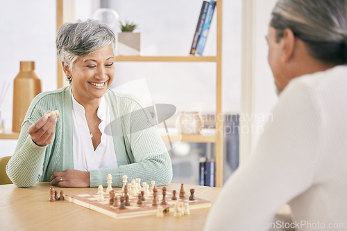 Image of Chess, happy and senior couple play games for relaxing, bonding and spending time together at home. Marriage, retirement and man and woman enjoying board game for challenge, strategy and thinking