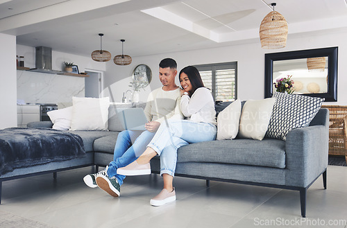 Image of Couple, laptop and streaming a movie on the sofa in home, living room or together watching tv, film or video on social media. Happy, people and relax on computer with online movies or comedy show