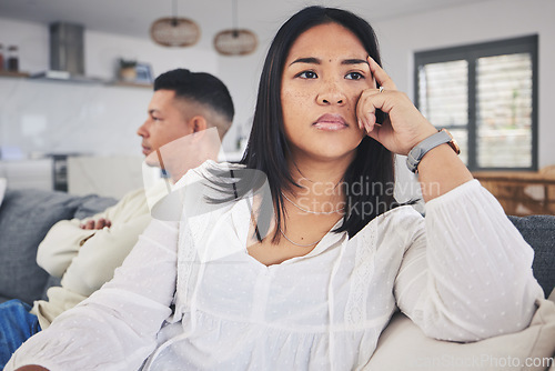 Image of Frustrated couple, fight and argument in divorce, conflict or disagreement on living room sofa at home. Unhappy man and woman in breakup, cheating affair or dispute from toxic relationship in house