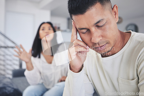 Image of Frustrated couple, headache and fight in argument, divorce or conflict from argument on living room sofa at home. Unhappy man and woman in breakup, cheating affair or toxic relationship at the house